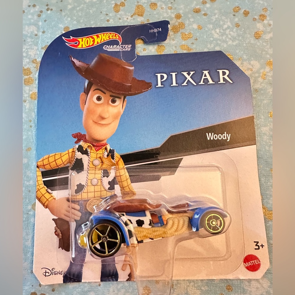HOT WHEELS X PIXAR WOODY car from “Toy Story.” NIP